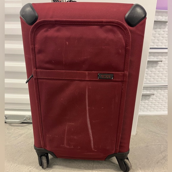 Tumi Other - TUMI Series 1 4-Wheeled Spinner Carry-On